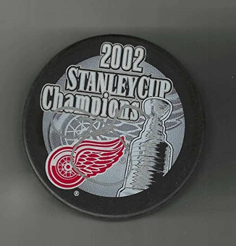 Jim Neill potpisao je pak prvaka Stanli kupa 2002. godine Detroit crvena krila - NHL pakove s autogramima